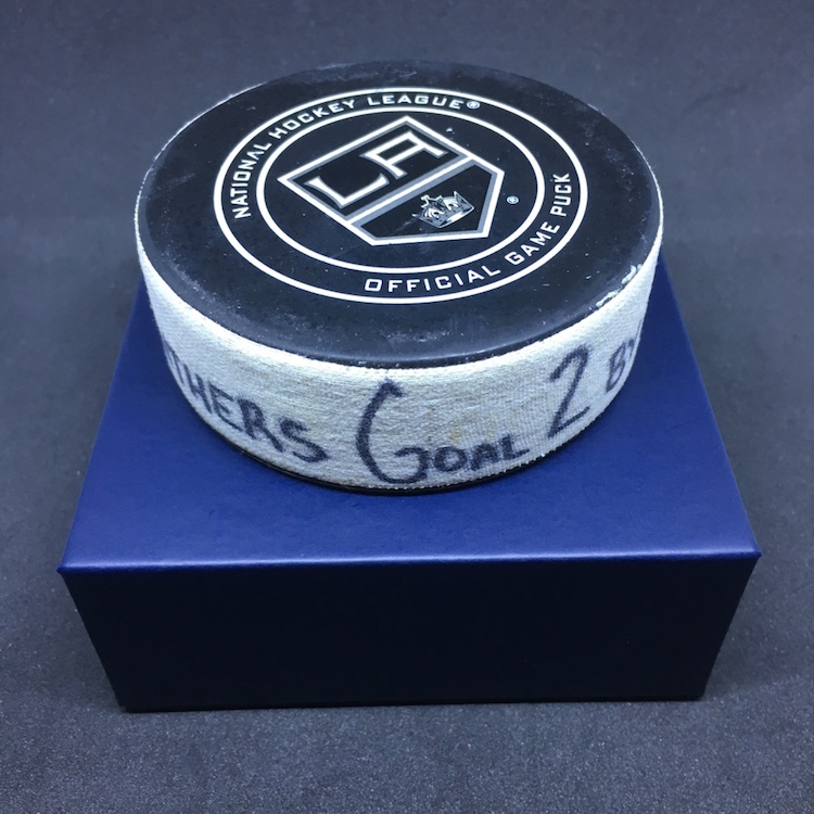 Collecting Game-used: Capturing a game-used puck in action / Blowout Buzz